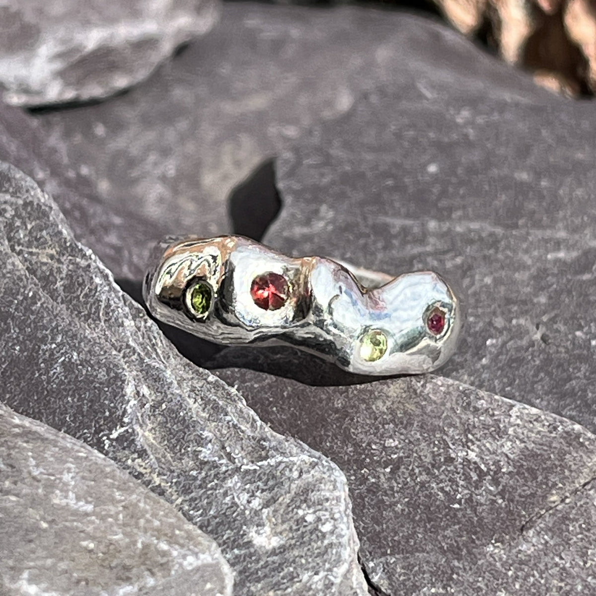 MOLTEN RING WITH GARNET AND TOURMALINE
